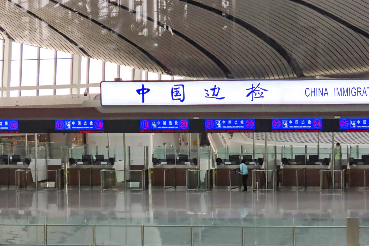 China Immigration Inspection sign and counters at Beijing Daxing International Airport